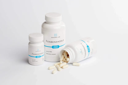 Fenbendazole bottles with pills on a white background