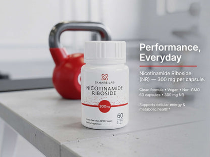 Supplement bottle labeled 'Nicolamin Riboside' on a kitchen counter with a kettlebell in the background.